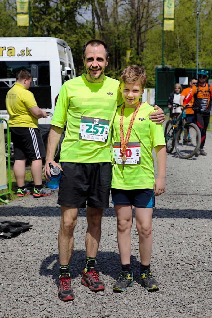 Our colleague Michal with his son at a running competition.